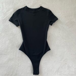 SKIMS- T-shirt bodysuit